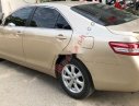 Toyota Camry 2010 - Cần bán gấp Toyota Camry sản xuất 2010, màu vàng