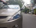 Mitsubishi Grandis AT 2009 - Cần bán Grandish sx 2009 số tự động, màu vàng cát