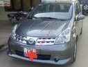 Nissan Grand livina   2010 - Bán Nissan Grand livina sản xuất 2010, màu xám, xe gia đình 