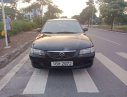 Mazda 626   2002 - Cần bán xe Mazda 626 sản xuất năm 2002, màu đen, 135tr