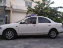 Mazda 323 1999 - Cần bán gấp Mazda 323 sản xuất năm 1999, màu trắng, nhập khẩu