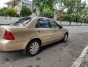 Ford Laser 2004 - Ford Laser 1.8 số tự động, vàng cát 2004