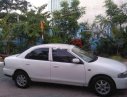 Mazda 323 1999 - Cần bán gấp Mazda 323 sản xuất năm 1999, màu trắng, nhập khẩu