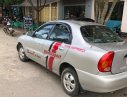 Daewoo Lanos SX 2004 - Bán ô tô Daewoo Lanos SX sản xuất năm 2004, màu bạc