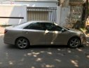 Toyota Camry Q 2016 - Bán Toyota Camry Q sản xuất năm 2016, màu vàng chính chủ, 935 triệu