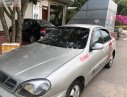 Daewoo Lanos SX 2004 - Bán ô tô Daewoo Lanos SX sản xuất năm 2004, màu bạc