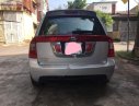 Kia Carens 2013 - Bán Kia Carens 2.0AT sản xuất năm 2013, màu bạc, số tự động