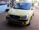 Hyundai Getz 2009 - Gia đình bán Hyundai Getz 2009, màu vàng 