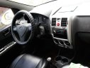 Hyundai Getz 2009 - Gia đình bán Hyundai Getz 2009, màu vàng 