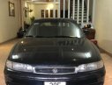 Mazda 626 1998 - Chính chủ bán lại xe Mazda 626 đời 1998, màu đen, xe nhập