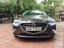 Mazda 2 2016 - Bán ô tô Mazda 2 năm 2016, màu xám số tự động