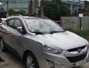 Hyundai Tucson   2011 - Bán Hyundai Tucson năm 2011, màu bạc, xe nhập