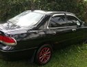 Mazda 626 1996 - Cần bán lại xe Mazda 626 sản xuất 1996, màu đen, xe nhập