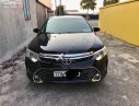 Toyota Camry 2015 - Cần bán Toyota Camry 2.0E sản xuất năm 2015, màu đen, chính chủ