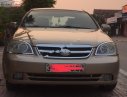 Daewoo Lacetti 2005 - Cần bán xe Daewoo Lacetti sản xuất 2005, màu vàng