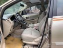 Toyota Innova E 2013 - Chính chủ bán Toyota Innova E đời 2013, màu vàng cát
