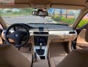 BMW 3 Series 2010 - Bán BMW 320i đời 2010, màu đen, nhập khẩu