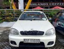 Daewoo Lanos SX 2002 - Cần bán gấp Daewoo Lanos SX đời 2002, màu trắng xe gia đình  