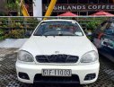 Daewoo Lanos SX 2002 - Cần bán gấp Daewoo Lanos SX đời 2002, màu trắng xe gia đình  