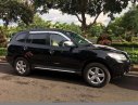 Hyundai Santa Fe  MT 2008 - Cần bán lại xe Hyundai Santa Fe MT đời 2008, màu đen