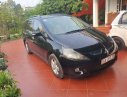 Mitsubishi Grandis 2006 - Cần bán gấp Mitsubishi Grandis sản xuất 2006, màu đen số tự động, giá tốt