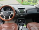 Hyundai Tucson 2011 - Bán Hyundai Tucson 2.0 AT 4WD sản xuất năm 2011, màu bạc, nhập khẩu nguyên chiếc