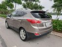 Hyundai Tucson 2011 - Bán Hyundai Tucson 2.0 AT 4WD sản xuất năm 2011, màu bạc, nhập khẩu nguyên chiếc