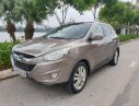 Hyundai Tucson 2011 - Bán Hyundai Tucson 2.0 AT 4WD sản xuất năm 2011, màu bạc, nhập khẩu nguyên chiếc