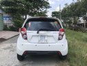 Chevrolet Spark   LT MT 2014 - Cần bán Chevrolet Spark LT MT năm sản xuất 2014, màu trắng xe gia đình, giá chỉ 225 triệu