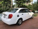 Daewoo Lacetti 2004 - Bán Daewoo Lacetti năm 2004, màu trắng số sàn, xe còn nguyên bản