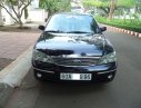 Ford Laser 2004 - Cần bán xe Ford Laser 1.8AT 2004, màu đen như mới giá tốt