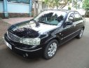 Ford Laser 2004 - Cần bán xe Ford Laser 1.8AT 2004, màu đen như mới giá tốt