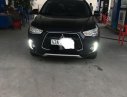 Mitsubishi Outlander    2016 - Bán ô tô Mitsubishi Outlander năm 2016, màu đen, nhập khẩu nguyên chiếc xe gia đình, giá chỉ 695 triệu