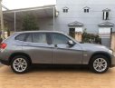 BMW X1   2010 - Cần bán xe BMW X1 sản xuất 2010, màu xám, nhập khẩu