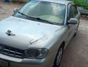 Kia Spectra 2004 - Cần bán gấp Kia Spectra 2004, màu bạc xe nguyên bản