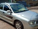 Kia Spectra 2004 - Cần bán gấp Kia Spectra 2004, màu bạc xe nguyên bản