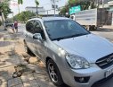 Kia Carens AT 2009 - Cần bán gấp Kia Carens AT sản xuất 2009, màu bạc, giá 298tr