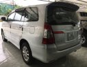 Toyota Innova 2014 - Cần bán Toyota Innova 2.0E sản xuất 2014, màu bạc, xe gia đình 