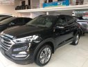 Hyundai Tucson 2019 - Cần bán Hyundai Tucson 2.0AT năm sản xuất 2019, màu đen, 870 triệu