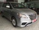 Toyota Innova 2014 - Cần bán Toyota Innova 2.0E sản xuất 2014, màu bạc, xe gia đình 