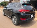 Hyundai Tucson 2018 - Cần bán Hyundai Tucson đời 2018, màu đen xe nguyên bản