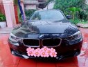 BMW 3 Series   2013 - Bán BMW 320i đời 2013, màu đen, nhập khẩu, chính chủ 