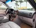 Kia Carnival 2.4 2009 - Bán Kia Carnival 2.4 sản xuất năm 2009, màu đen xe gia đình, 245tr