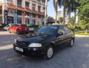 Ford Laser 2000 - Bán ô tô Ford Laser sản xuất năm 2000, màu đen xe còn mới