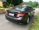 Toyota Corolla 2010 - Cần bán gấp Toyota Corolla XLi 1.6 năm 2010, màu đen, xe nhập