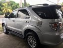 Toyota Fortuner 2014 - Cần bán xe Toyota Fortuner đời 2014, màu bạc xe nguyên bản