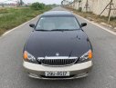 Daewoo Magnus   2004 - Bán xe cũ Daewoo Magnus 2.5 AT 2004, màu đen