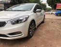 Kia K3 1.6 MT 2014 - Cần bán xe Kia K3 1.6 MT sản xuất năm 2014, màu trắng, giá 425tr