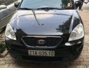 Kia Carens EXMT 2014 - Cần bán Kia Carens 2.0 đời 2014, màu đen, chính chủ, giá 318tr