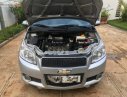 Chevrolet Aveo 2015 - Cần bán gấp Chevrolet Aveo sản xuất 2015, màu bạc